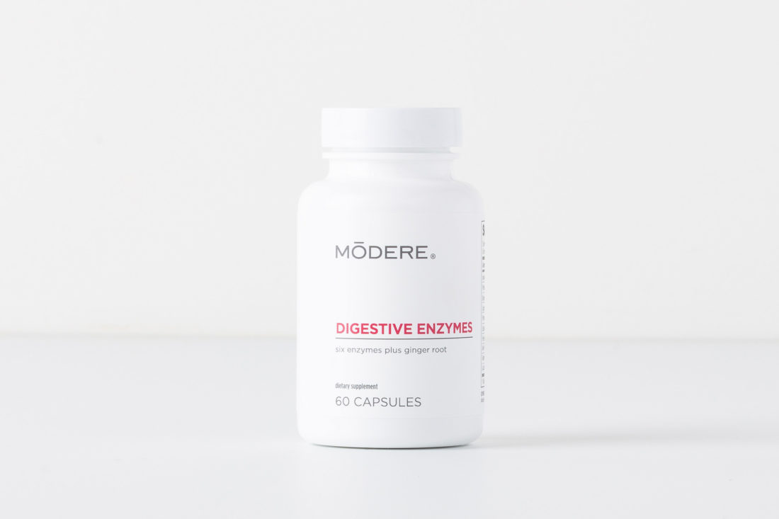 Modere Digestive Enzymes on a plain background